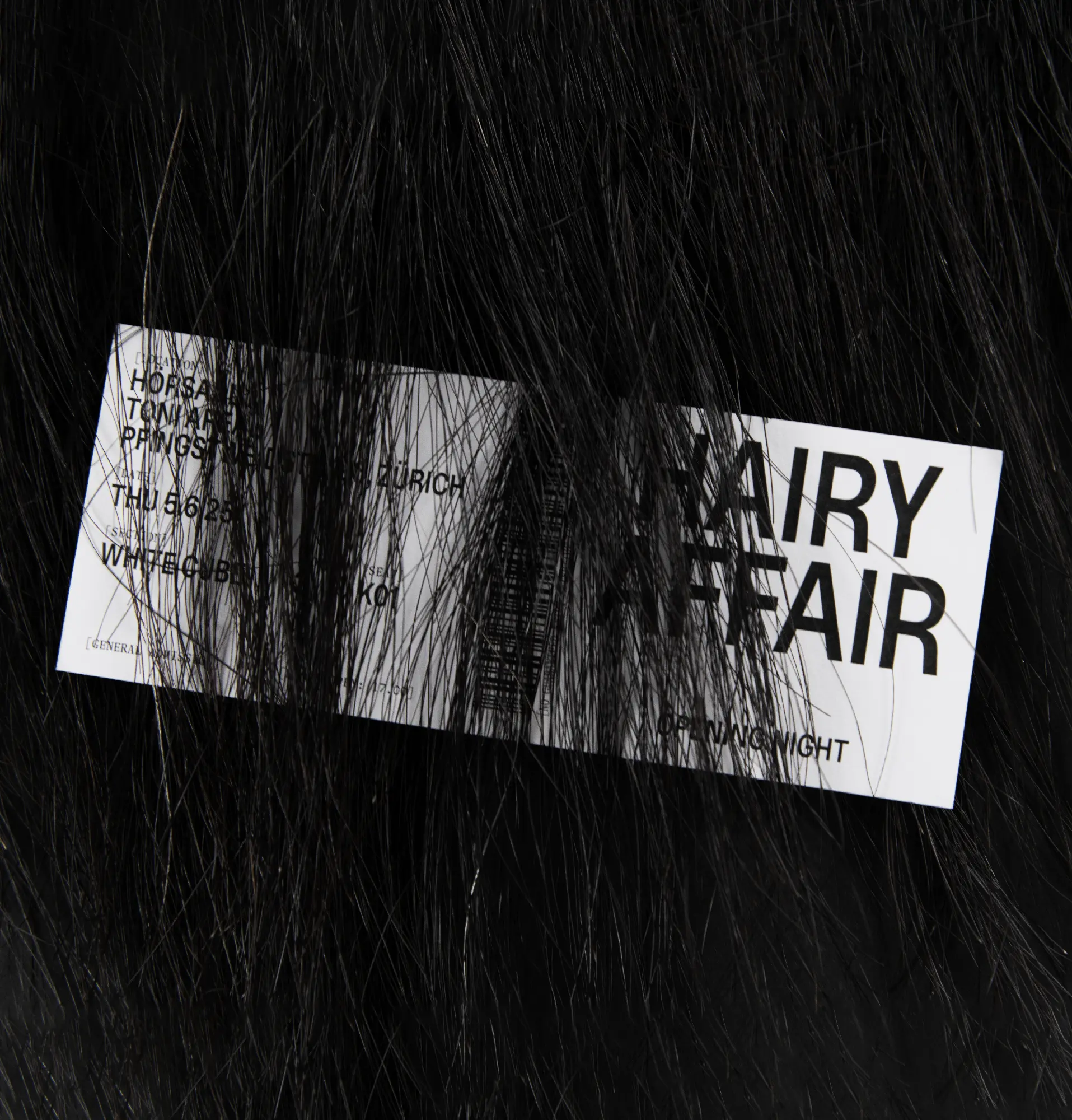 Hairy Affair Ticket in hair binding
